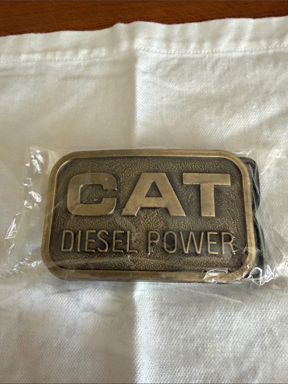 CAT Diesel Power Brass Belt Buckle new in wrap